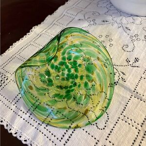 Vintage hand blown bubble glass with two shades of green, has a point and a flip